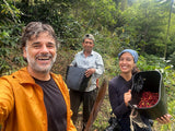 happy people with coffee farmer